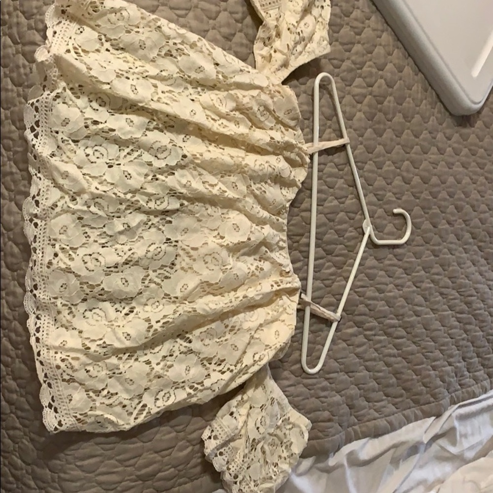 Floral top with off the shoulder sleeves